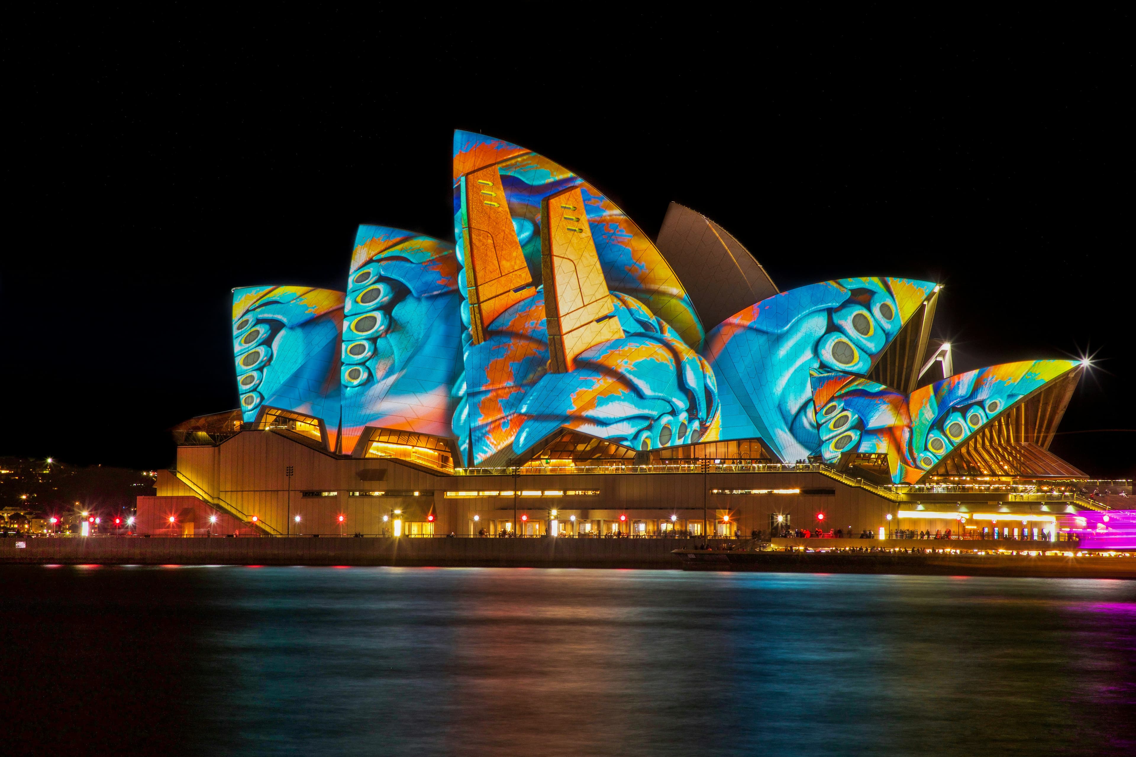 Sydney Opera House illuminated at night in Australia